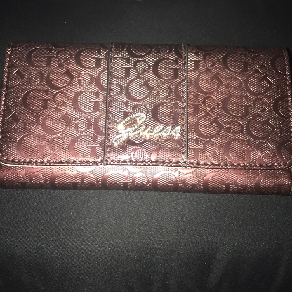 Guess women’s wallet.